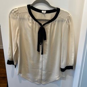 Aritzia T Babaton silk blouse with black necktie and trim. Size S.
